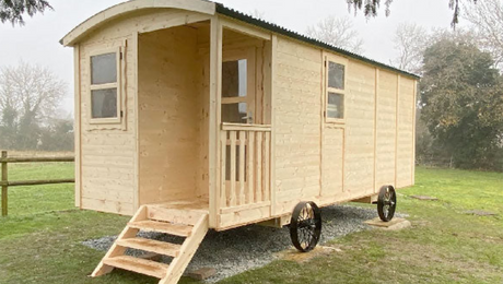 Shepherd Huts vs Log Cabins